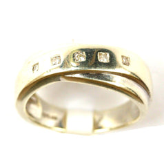 9ct White 5 Stone Twist Band .10 points