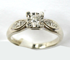 9ct white sol. With diamond shoulders(0.20pts)