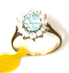 9ct yellow cubic zirconia & light blue stone