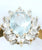 9ct cubic zirconia & light blue stone