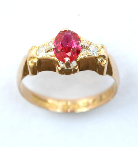 18ct ruby solitaire with diamond shoulders