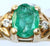 9ct emerald solitaire with diamond chips