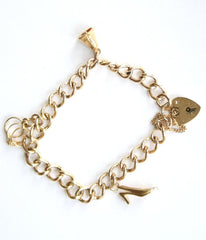 9ct heavy charm bracelet with 3 charms